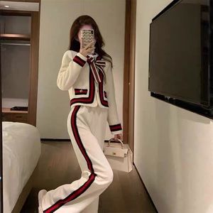 Cute classy lounge white set with bowtie and gold buttons